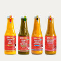 All four Peruana Peruvian hot sauces: Aji Amarillo, Aji Verde, Rocoto and Charapa